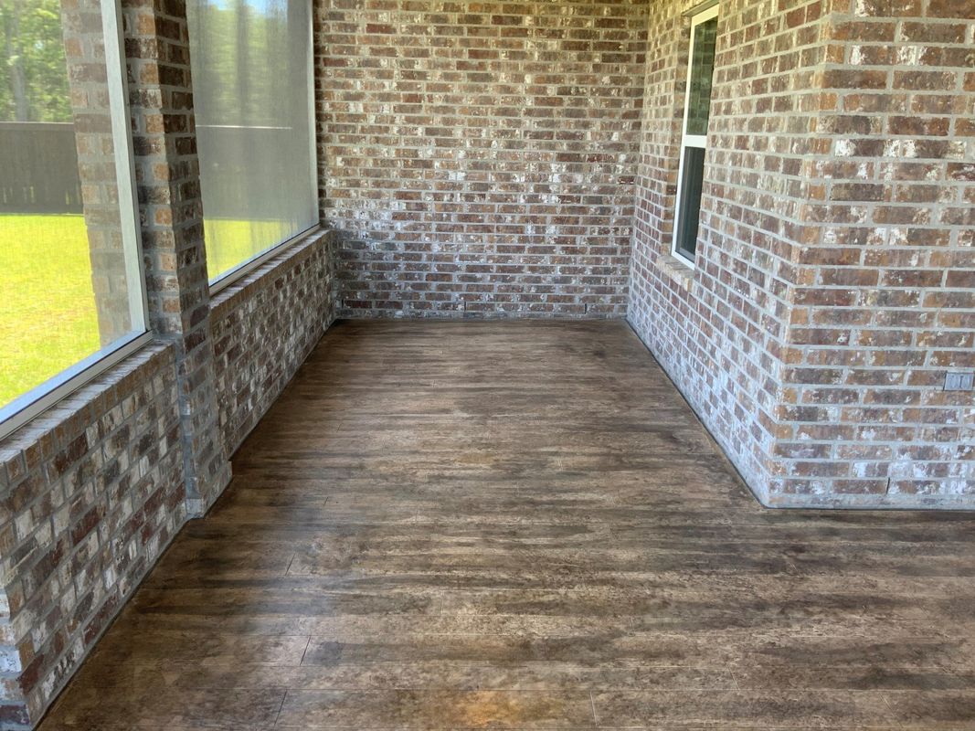 Stain overlay concrete by Decorative Concrete Designs