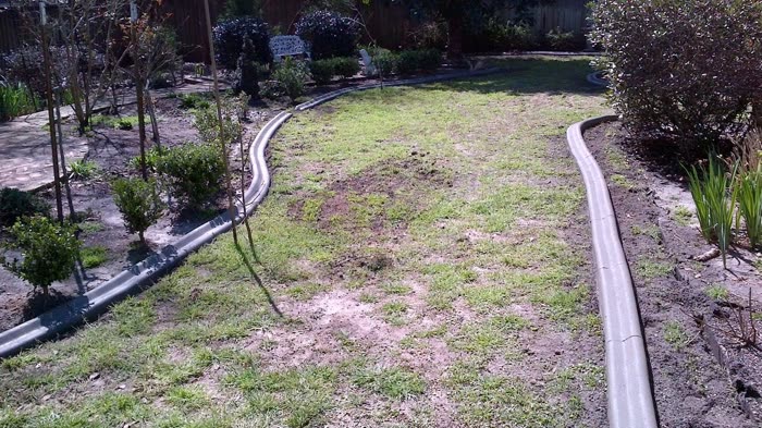 Landscape curb by Decorative Concrete Designs